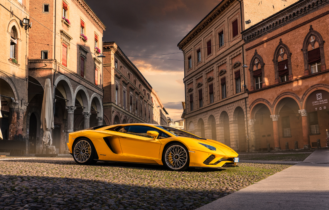 Yellow Aventador S in an Italian square surrounded by porches